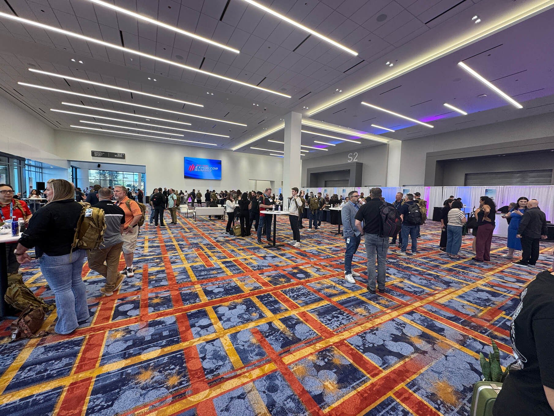 Exhibitors networking in the hall at the SEMA Exhibitor Summit